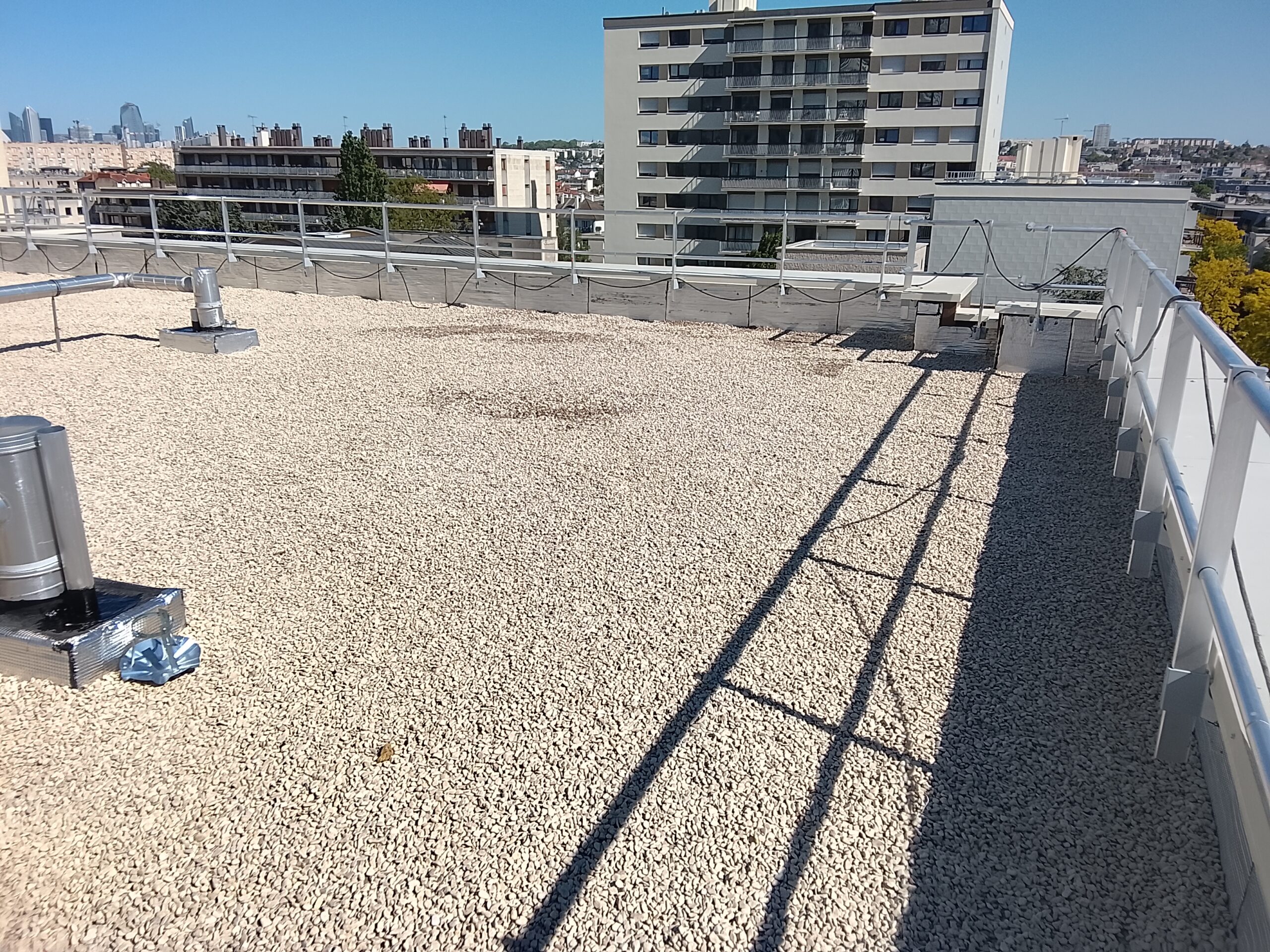 Réfection totale d'étanchéité d'une toiture terrasse gravillonnée, photo 3